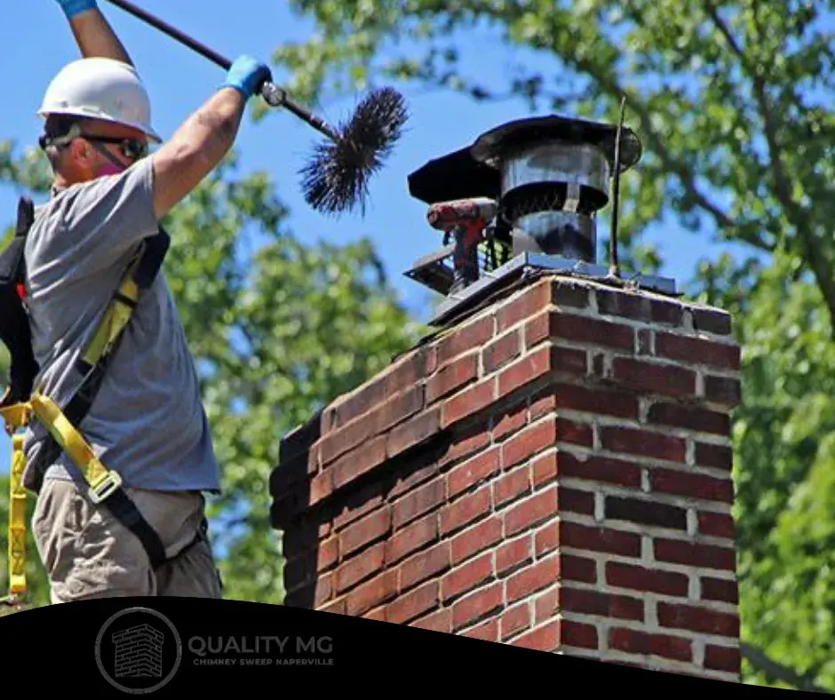 Technician using specialized tools to clean a vintage brick chimney, ensuring proper care and maintenance.